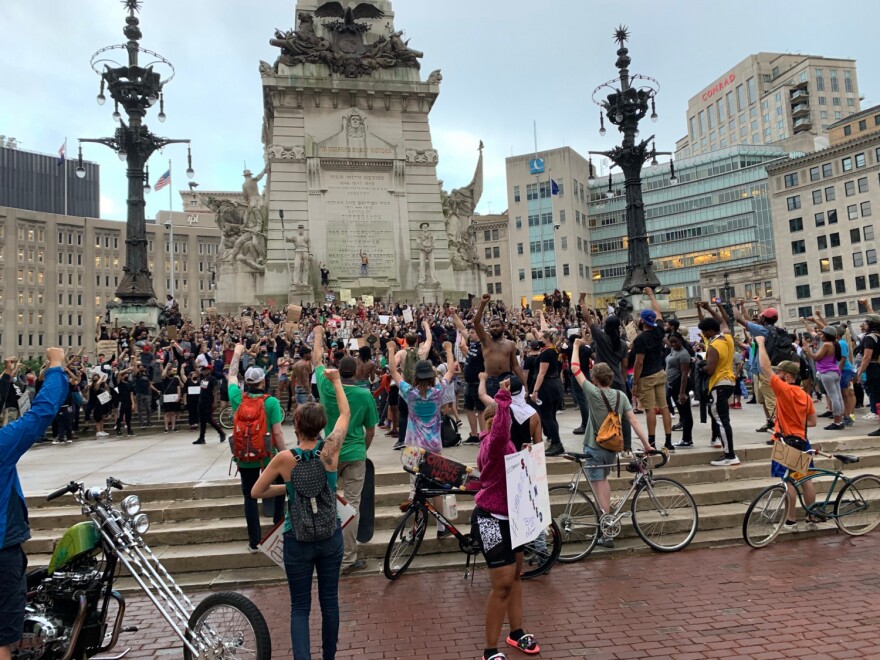 A group of protestors on Monument Circle.