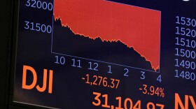 A screen on the trading floor displays the Dow Jones Industrial Average at the New York Stock Exchange in September. Stocks have kept falling since then and hit their low for the year on Friday.