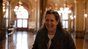 Joni Arnett laughs in the rotunda of the Iowa State Capitol
