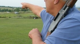 Bob Juden in field where his son honed shooting skills.