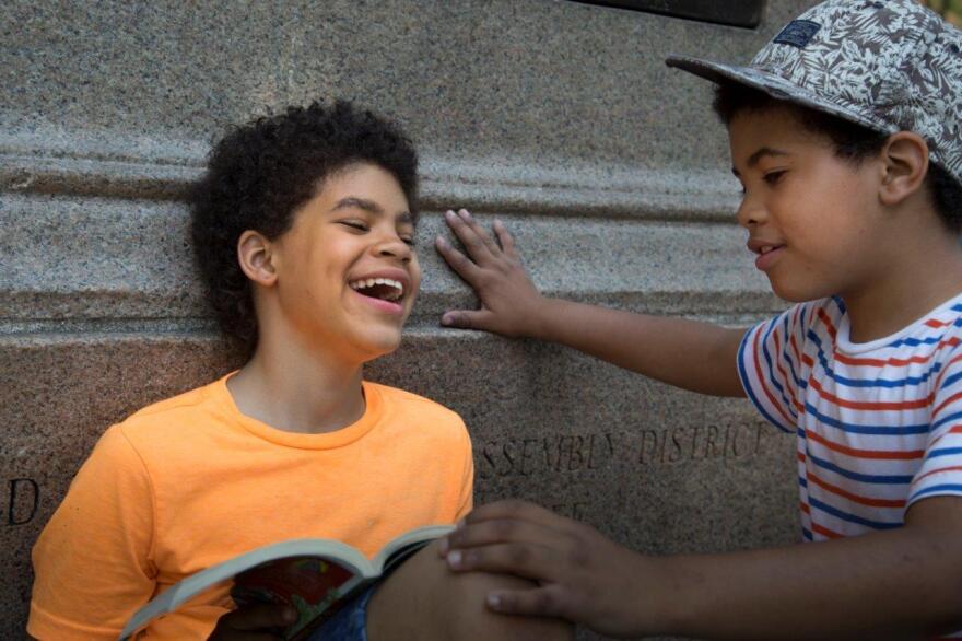 Q, left, and his brother, Noah, are close.