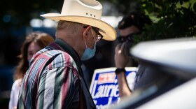 A voter leaves Ben Hur Shrine after casting a ballot during the primary runoff elections in July. 