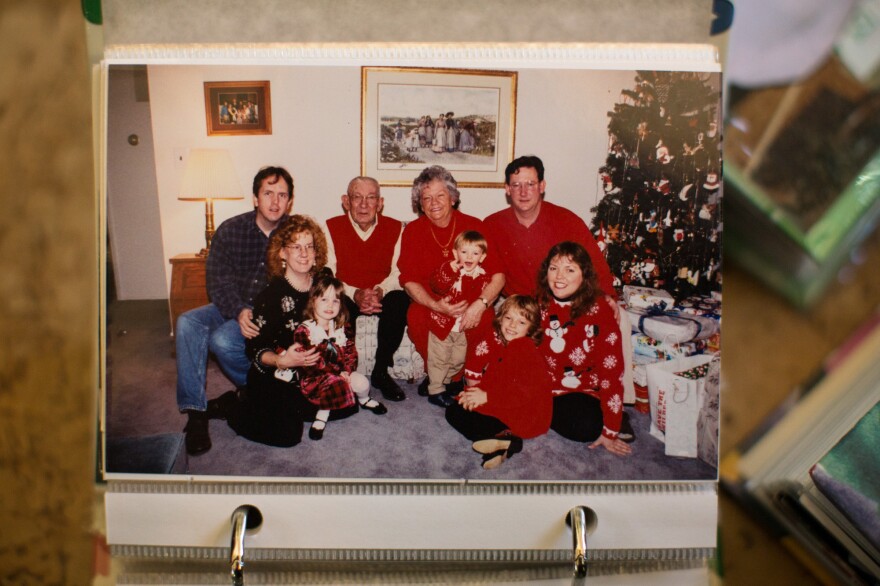 Helen and her late husband, Raymond, pose with the family in 1997. Christmas was a big event then, with matching outfits, stacks of presents and lots of food.