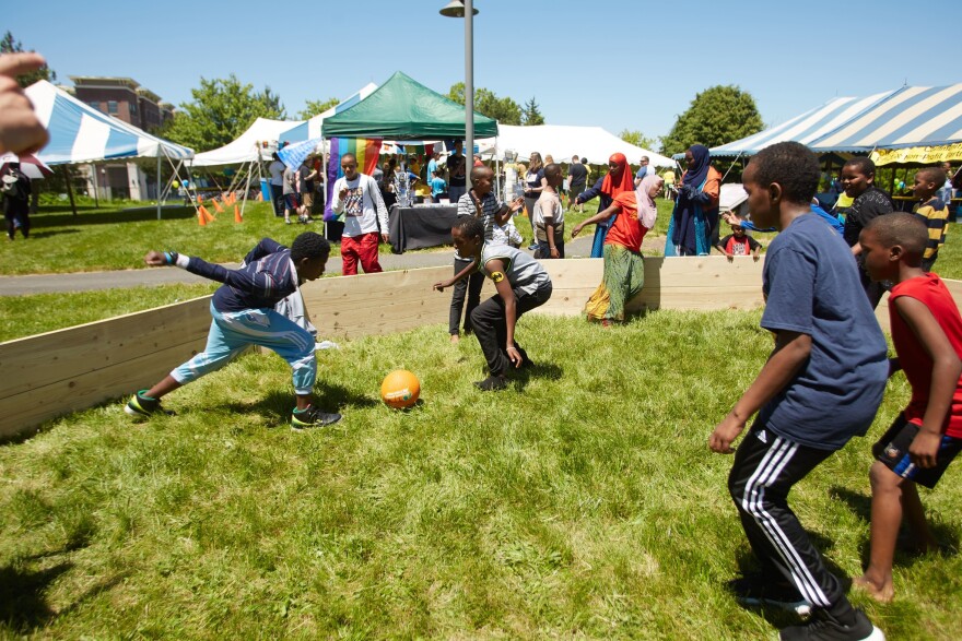 Children play soccer at a previous Duck Race event.
