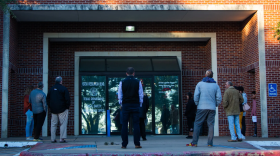 A line begins to form outside the Texas Department of Safety office in northwest Austin shortly before it opens at 8 a.m. on Jan. 24, 2019.