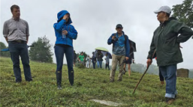 Students from the University of Georgia tour District Hill Cemetery.