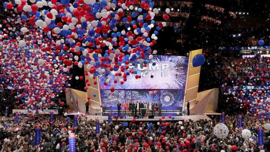 Republican Presidential Candidate Donald Trump, and Republican Vice Presidential Nominee Gov. Mike Pence of Indiana watch with their families as the balloons fall during the final day of the Republican National Convention in Cleveland, Thursday, July 21, 2016. (AP Photo/J. Scott Applewhite)