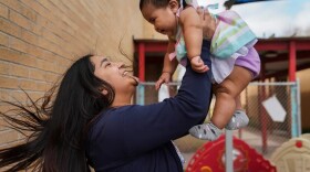 High school junior Iryanna Rodriguez, 18, plays with her 9-month-old daughter, Ariyanna Juliett Fuentes, at Lincoln Park High School in Brownsville. The school enrolls teens who are pregnant or parenting and offers a host of resources, including child care.