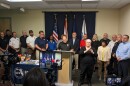 Leon County Emergency Management Director Kevin Peters (at the podium) stands before City of Tallahassee, Leon County, Leon School District and local non-profit human service officials to urge area residents to get ready for what could be an historically busy hurricane season.