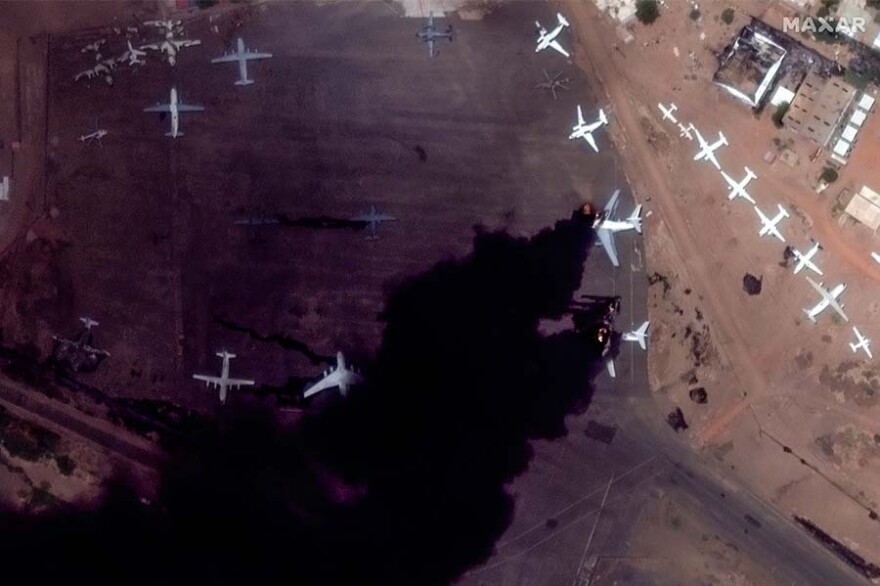 Satellite images show passenger planes burning at the Khartoum International Airport in Sudan.