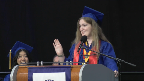 Evelyn Gallagher, Kempsville High School's first transgender salutatorian, gives a speech during graduation on June 13, 2026.