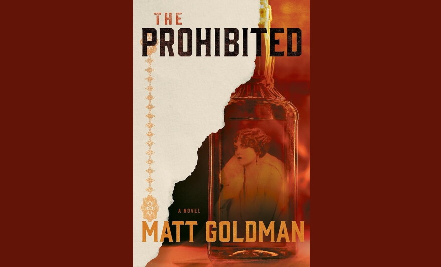 cover of "The Prohibited" by Matt Goldman; image in red and orange of a woman seen through the glass of a whiskey bottle
