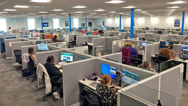 In this file photo, workers at a Medicaid call center in Jefferson City, Mo., field questions and review information regarding eligibility determinations on Aug. 16, 2023.