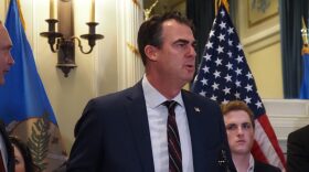 Gov. Kevin Stitt has proposed further cuts to Oklahoma's state and corporate income taxes, but his office disagrees with projections of the proposal's impacts provided by an independent think tank. Stitt is pictured speaking about a statewide grocery tax cut during a bill signing ceremony on Feb. 27.
