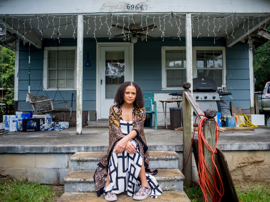 Jesmyn Ward poses for a portrait outside her great-grandmother's house in Pass Christian, Miss.