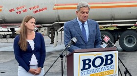  Bob Stefanowski at Tuxis Ohr's fuel, with the company's vice president, Katie Childs.