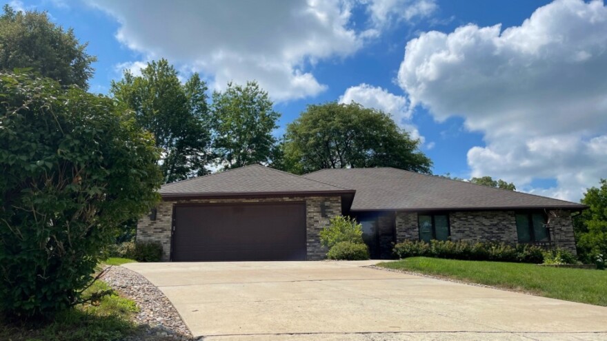 A central Iowa nurse is accused of attempting to exploit a potential gap in state regulation by running an illegal, unlicensed care facility out of this house in Des Moines.