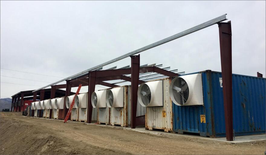 Bitcoin mines -- or data centers -- are popping up near the Wenatchee airport among other places. Some are installed inside used cargo containers, which local councils increasingly are banning for this use. CREDIT: TOM BANSE
