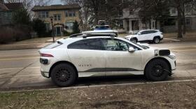 A Waymo autonomous vehicle is parked Thursday, March 26, 2026, on Marshall Avenue in St. Paul.