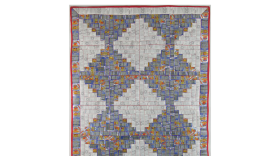 The House Always Wins is a quilt, created from over $5,000 worth of spent lottery tickets that the artist, Elisha Frontz, discovered in her father-in-law's home.