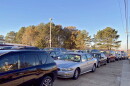  Mississippi residents wait in line in their cars to receive food and supplies at the Saint Luke’s Food Pantry in Tupelo, Dec. 2, 2021. Despite increases to the social safety net in 2021, Saint Luke’s would routinely see lines of cars in their parking lot spill out into the nearby streets full of families looking for help with food and supplies.