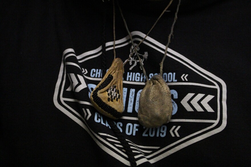 Kenneth Huffer says he wears his tribes ceremonial medicine bag and buffalo stone necklace every day. (Photo by Wesley Early, Alaska Public Media - Anchorage)