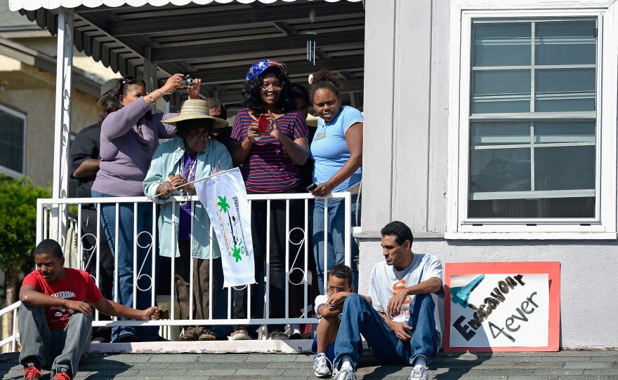 As it wound through South Los Angeles, residents welcomed its presence. Before the move, some lamented over the loss of shade as trees were chopped down to provide clearance.