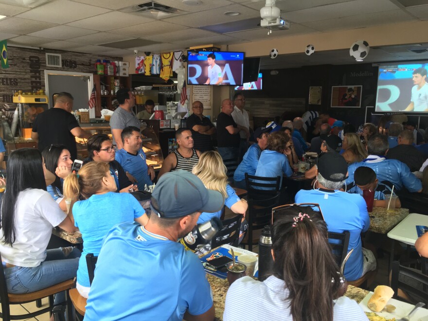 Crowd of fans clad in Uruguay baby blue at Al Pan Pan restaurant in West Palm.