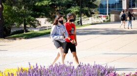 Students walk the Quad