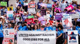 Hundreds gather during a rally in support of voter-backed initiatives legalizing abortion and guaranteeing paid sick leave at the state capitol on Thursday, May 15, 2025, in Jefferson City.