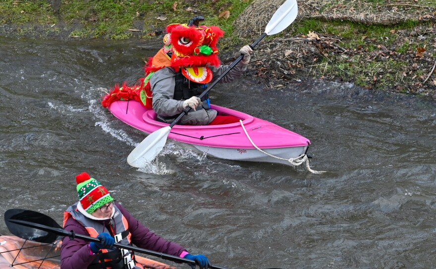 A paddler is dressed as a Chinese dragon to celebrate the Chinese New Year on Feb. 10 during the LRCA's ShiverFest on Saturday, Jan. 13.