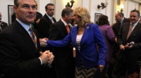 Oklahoma Attorney General Scott Pruitt prepares to greet Gov. Mary Fallin at the 2013 State of the State address at the state capitol.