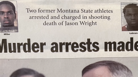 Screen capture from the documentary film “Big Sky Falling” showing a newspaper front page with the headline “Murder arrests made.” Above it, a smaller headline reads, “Two former Montana State athletes arrested and charged in shooting death of Jason Wright.” Mugshots of two men appear in the top corners, labeled “Miller” on the left and “Lebrum” on the right, with “Gallatin County” visible beneath the left photo. 