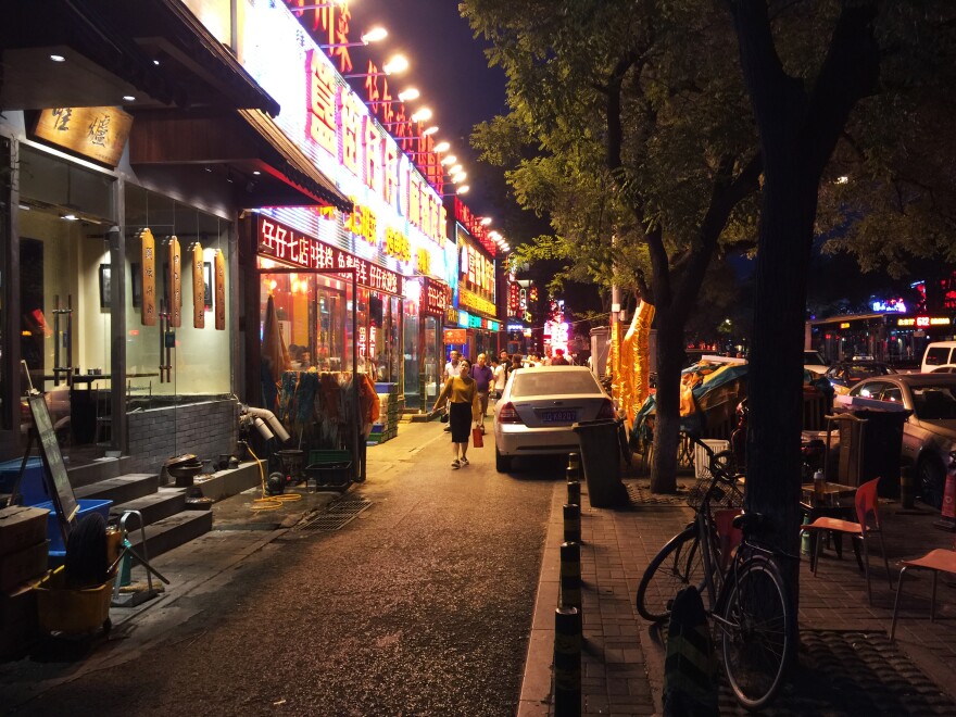 Restaurants stay open late into the night on Beijing's Dongzhimennei Street, including A Very Long Time Ago, which reintroduced the practice of tipping waitstaff last October.