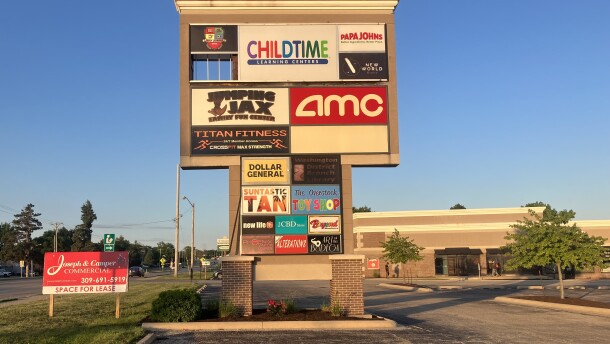 Many of the businesses located in Washington Plaza are advertised on this roadside sign along Washington Road.
