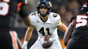 FILE - California Golden Bears linebacker Luke Ferrelli (41) rushes against Oregon State during the first half of an NCAA college football game, Aug. 30, 2025, in Corvallis, Ore. (AP Photo/Mark Ylen, File)