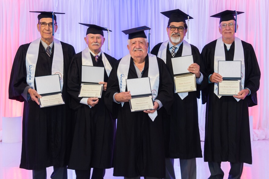 Vets pictured in 2019 receiving their High School Diplomas