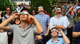 New York, NY, USA August 21. New Yorkers don their solar glasses to view the solar eclipse in Bryant Park in Manhattan<br/><br/>