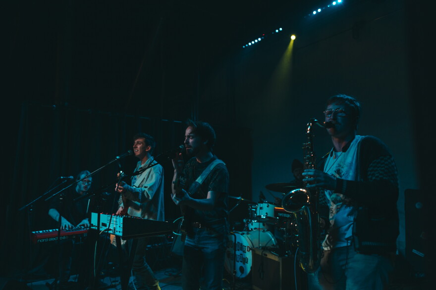 A band performing on stage.