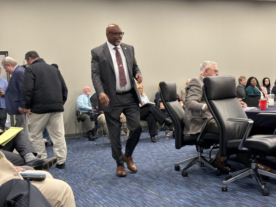 Arkansas Division of Correction Director Dexter Payne prepares to take his seat at a Board of Corrections meeting on Jan. 31, 2024.