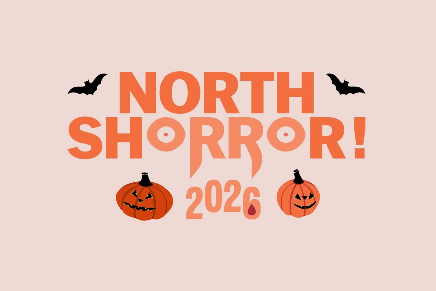 Simple pink and orange sign for "North Shorror! 2026" with two pumpkins and two bats flanking the text