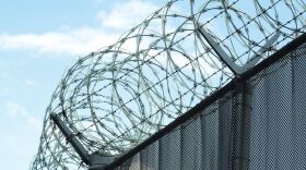 Razor wire on top of the perimeter fence at the Hampden County Correctional Center in Ludlow, Massachsuetts.