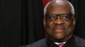 United States Supreme Court Associate Justice Clarence Thomas poses for an official portrait at the East Conference Room of the Supreme Court building in Washington, DC.