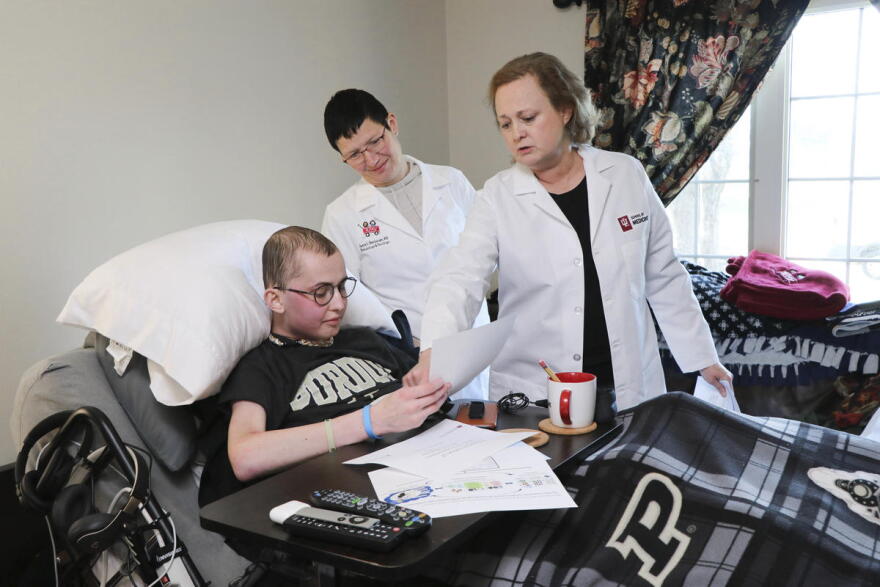 Tyler Trent speaks with Indiana University researchers at his home, one month before his death.