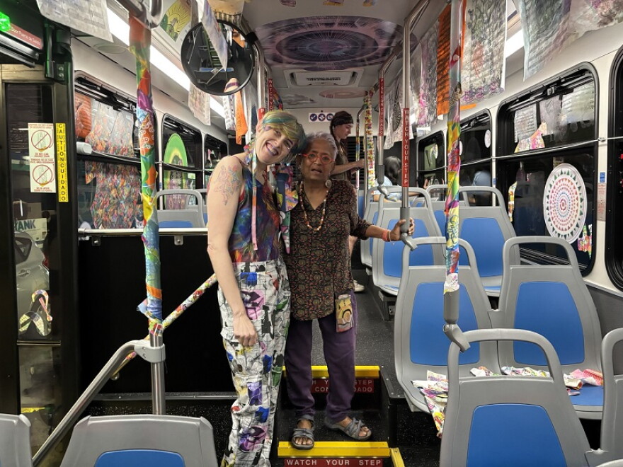 Artists Lindsey Whittle, also known as Sparklezilla, and Radha Lakshmi created a mini moving art gallery honoring compassion and the sacred.