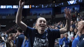 UConn guard Paige Bueckers leaves the court after a game against Southern California in the Elite Eight of the NCAA college basketball tournament Monday, March 31, 2025, in Spokane, Wash. (AP Photo/Jenny Kane)