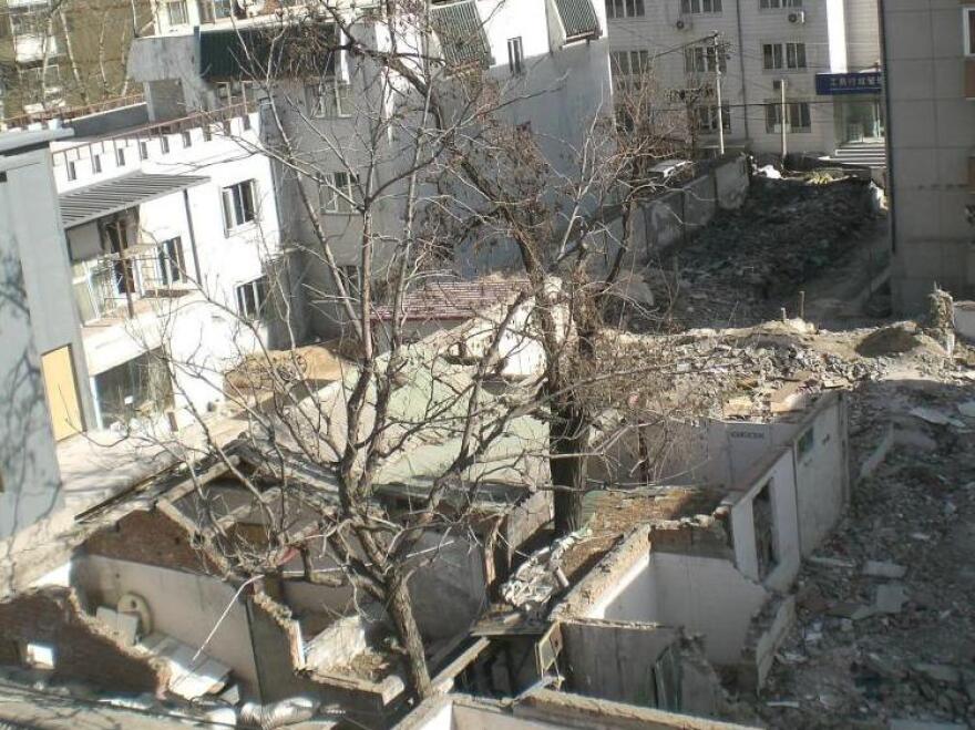 Liang Sicheng, known as the father of modern Chinese architecture, lobbied Mao Zedong to preserve ancient buildings in Beijing. Despite efforts to have his former courtyard home in Beijing preserved as a cultural relic, it was recently demolished.