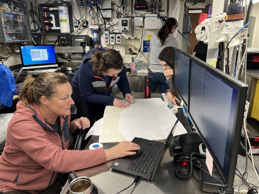  Scientists Jennifer Fisher and Clara Bird map out sampling stations along the Oregon and Washington coasts.