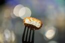 A nugget made from lab-grown chicken meat is seen during a media presentation in Singapore, the first country to allow the sale of meat created without slaughtering any animals.