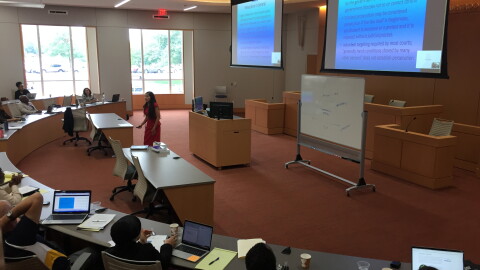 During a training Wednesday, U. of Akron Assistant Law Professor Elizabeth Knowles tells attendees that immigration attorneys not only have to often overcome language barriers, but also find ways to build rapport with clients who've gone through trauma.